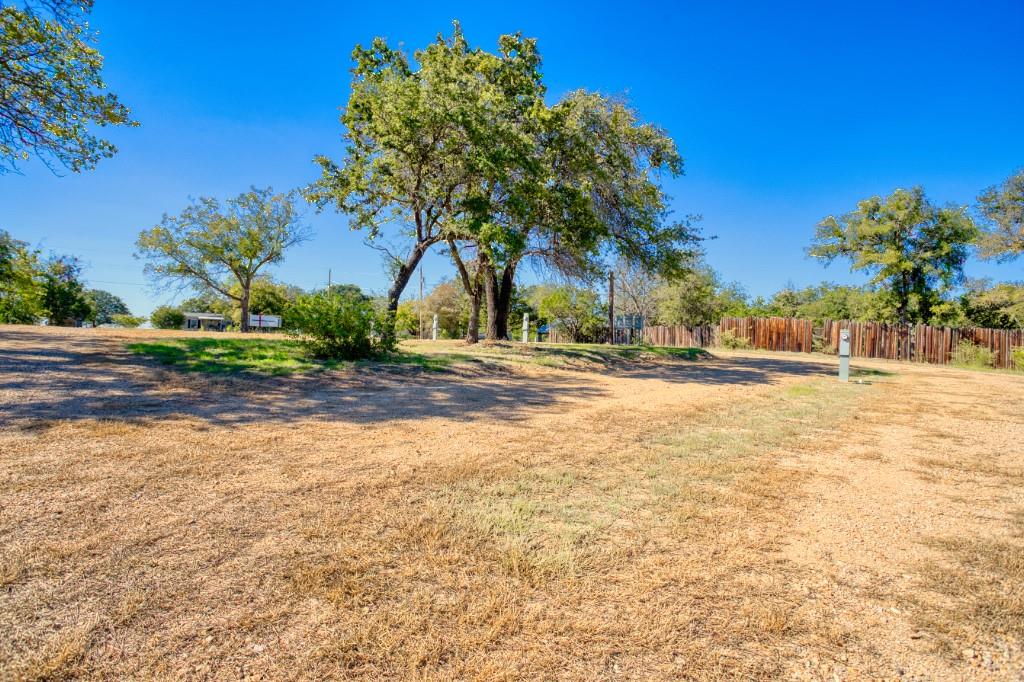 247 South Caddo Street Lipan, TX 76462 - Photo 22 of 29 a view of a yard with a house