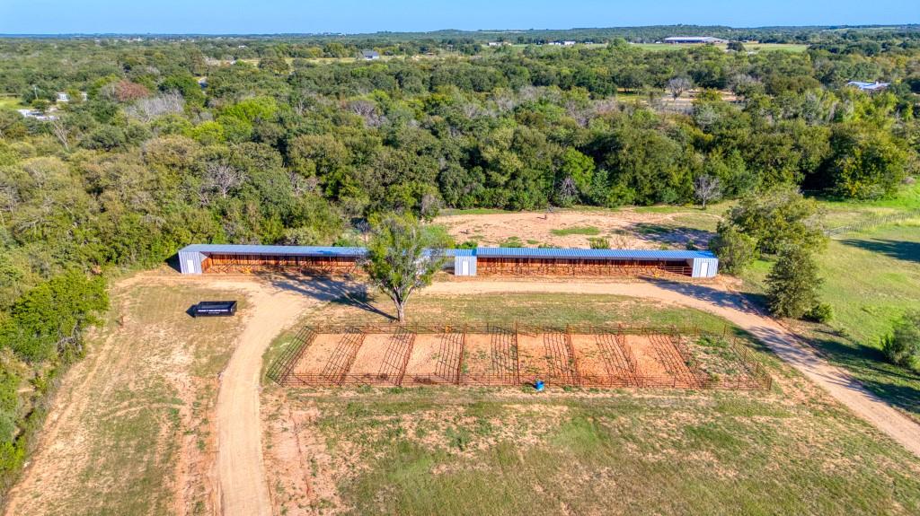 247 South Caddo Street Lipan, TX 76462 - Photo 4 of 29 a view of a yard with an outdoor space