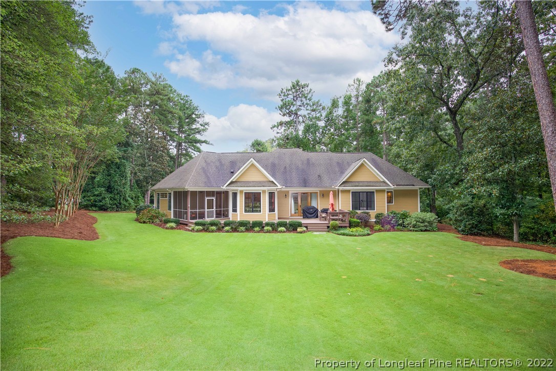 480 Highland Road Southern Pines, NC 28387 - Photo 46 of 50 a view of a house with a big yard