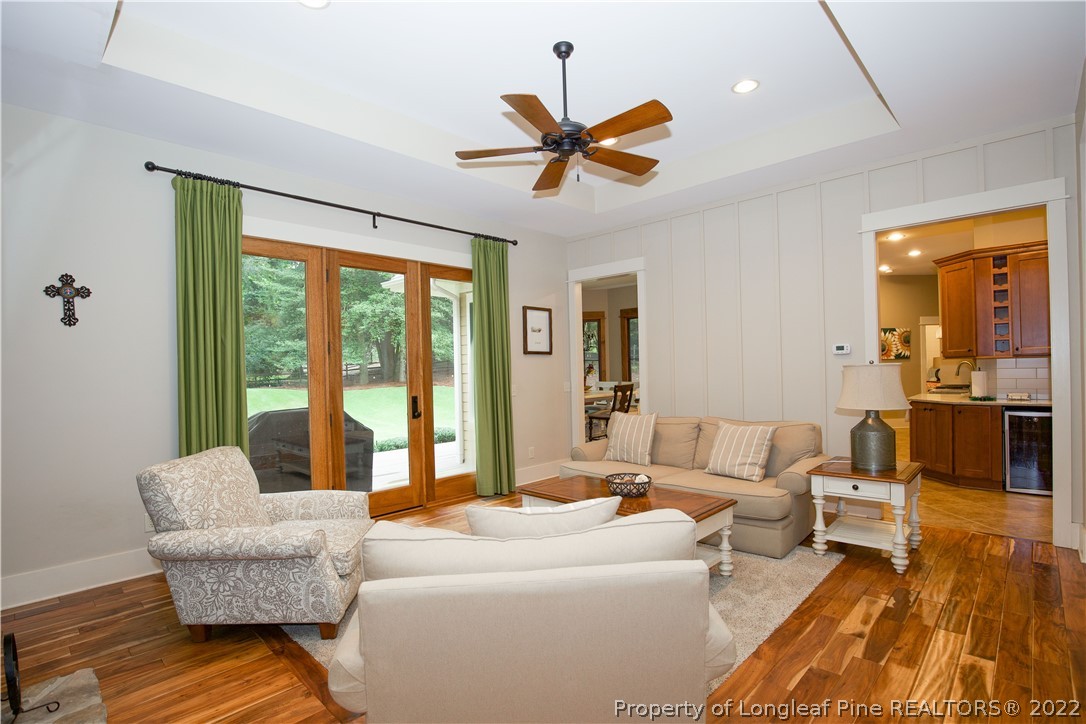 480 Highland Road Southern Pines, NC 28387 - Photo 8 of 50 a living room with furniture and a large window