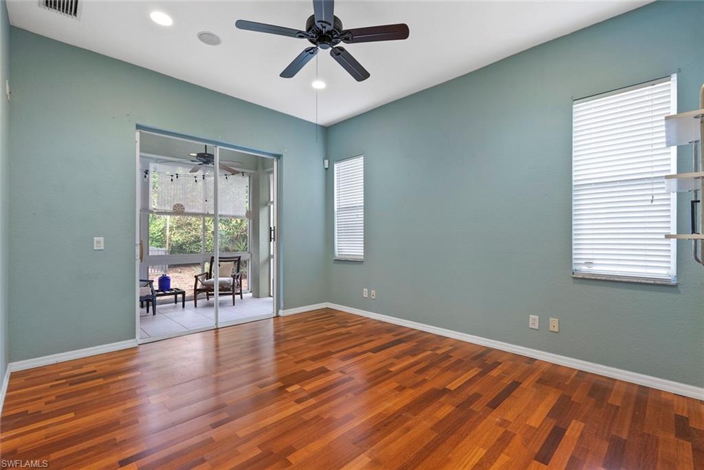 3262 Citron Drive Naples, FL 34120 - Photo 20 of 38 a view of empty room with wooden floor and fan