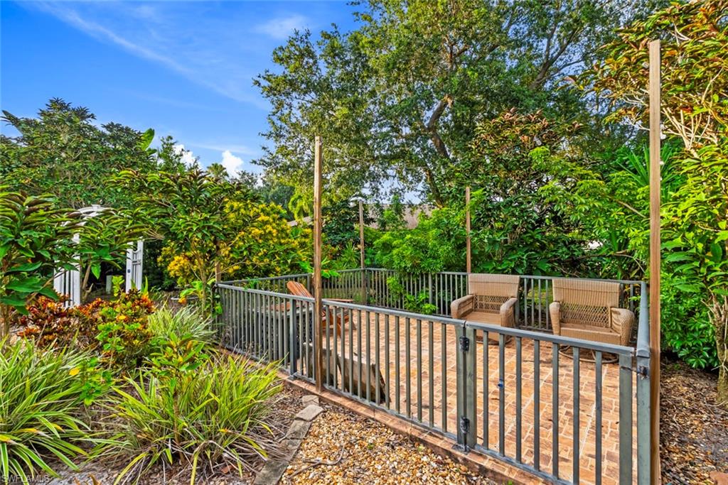 3262 Citron Drive Naples, FL 34120 - Photo 28 of 38 a view of a balcony with wooden floor