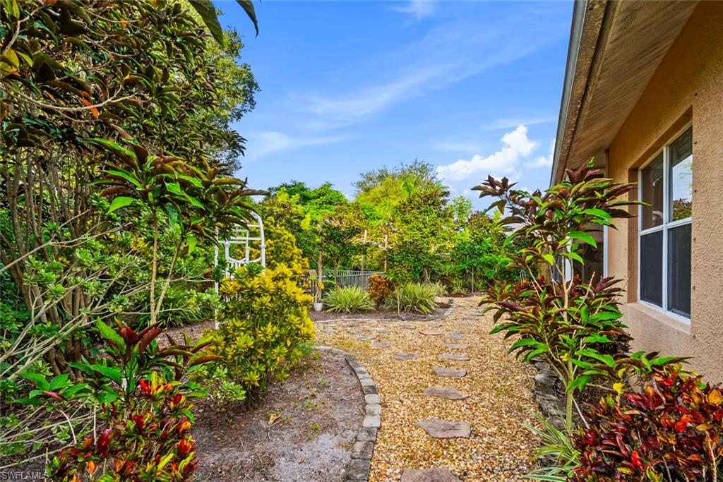 3262 Citron Drive Naples, FL 34120 - Photo 31 of 38 a view of a yard with plants