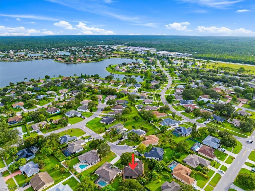 3262 Citron Drive Naples, FL 34120 - Photo 32 of 38 a view of a lake