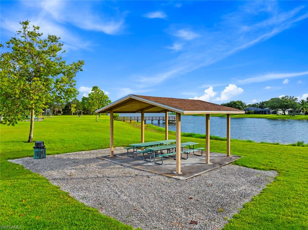 3262 Citron Drive Naples, FL 34120 - Photo 35 of 38 a view of a house with a yard