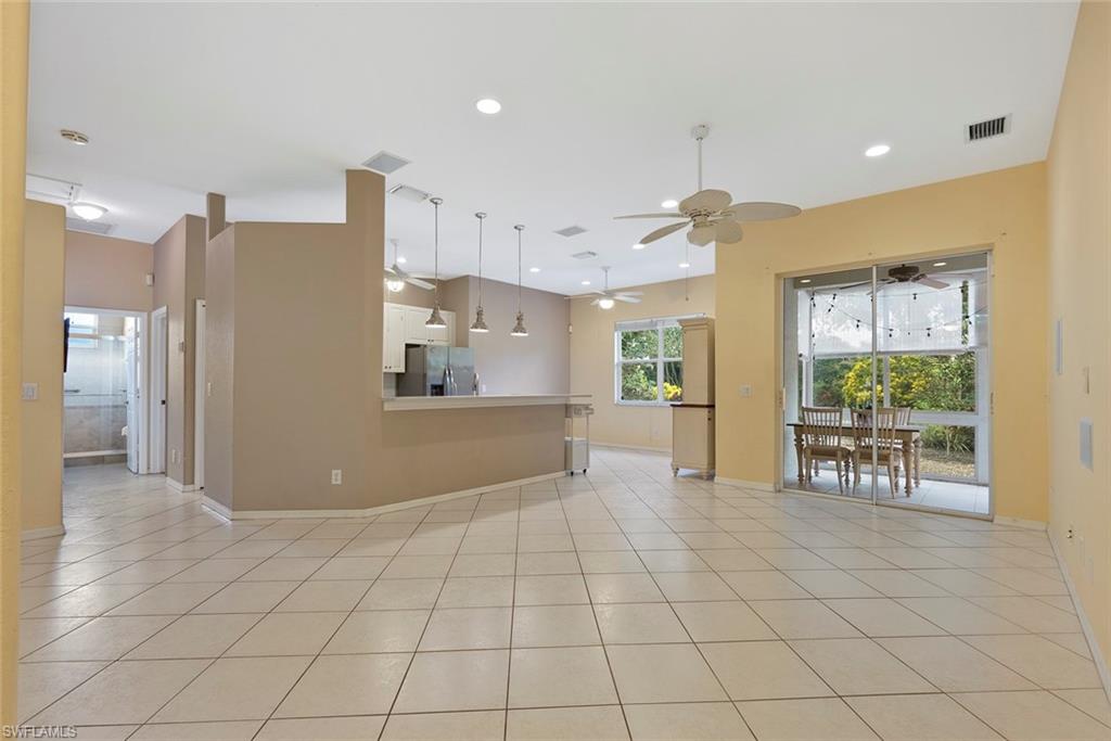 3262 Citron Drive Naples, FL 34120 - Photo 6 of 38 a view of kitchen with furniture and window