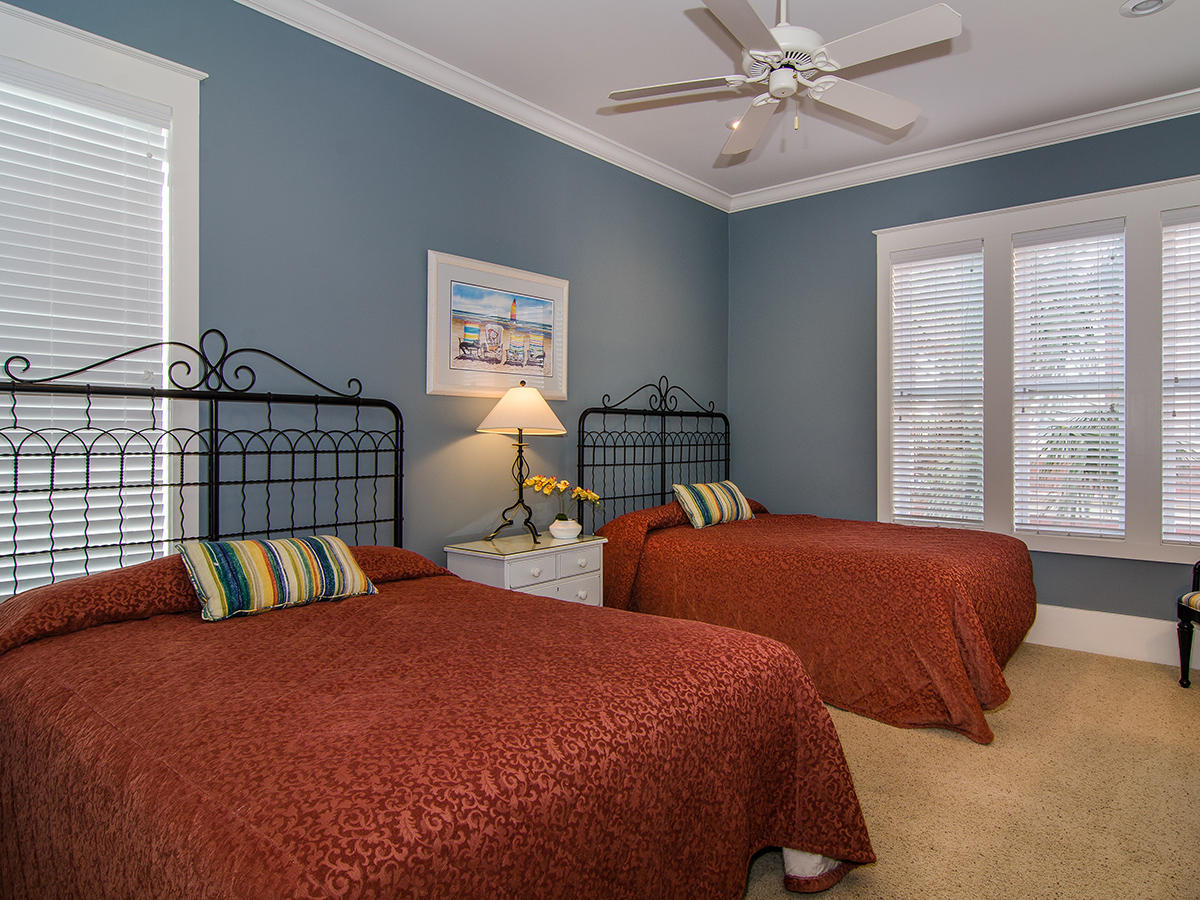 617 Blue Mountain Road Santa Rosa Beach, FL 32459 - Photo 17 of 24 a bedroom with two beds and two window