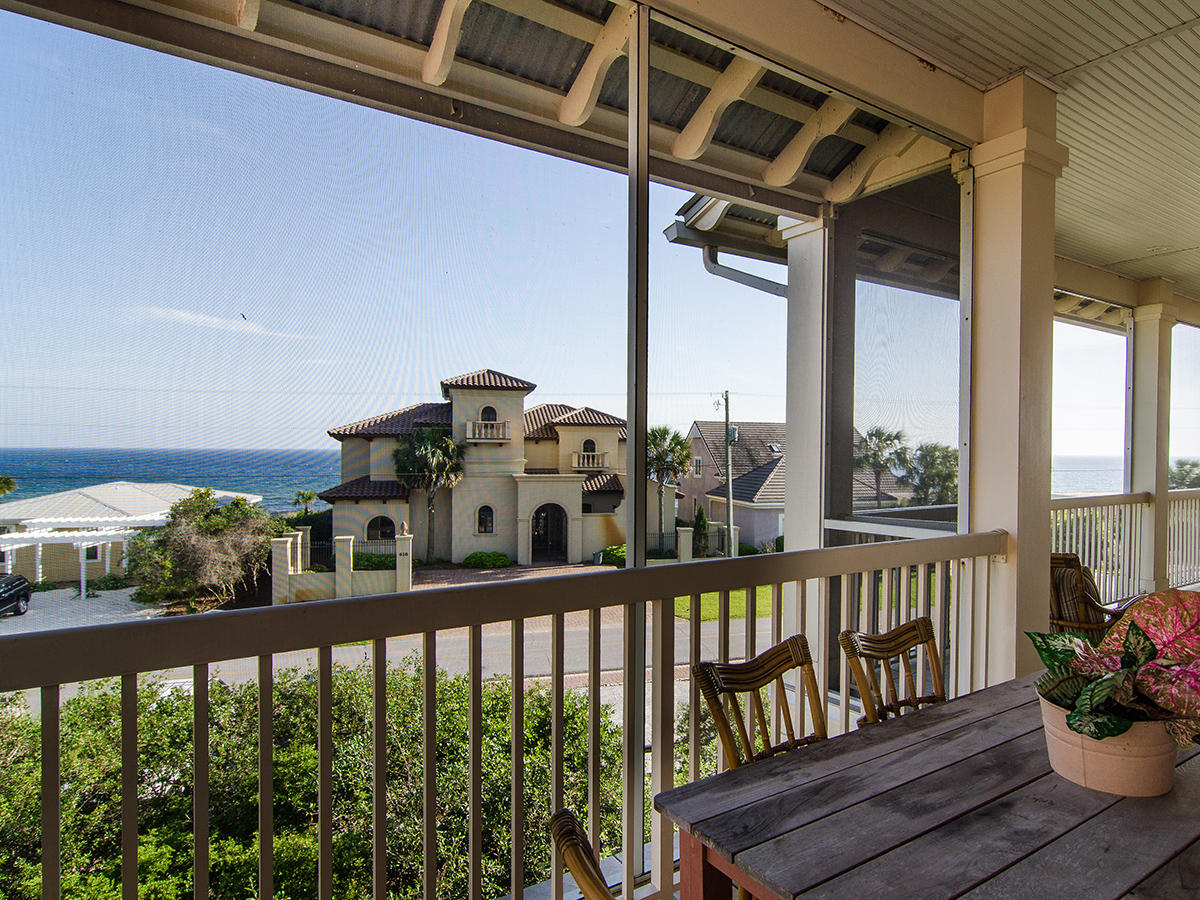617 Blue Mountain Road Santa Rosa Beach, FL 32459 - Photo 20 of 24 a view of a balcony with an outdoor seating