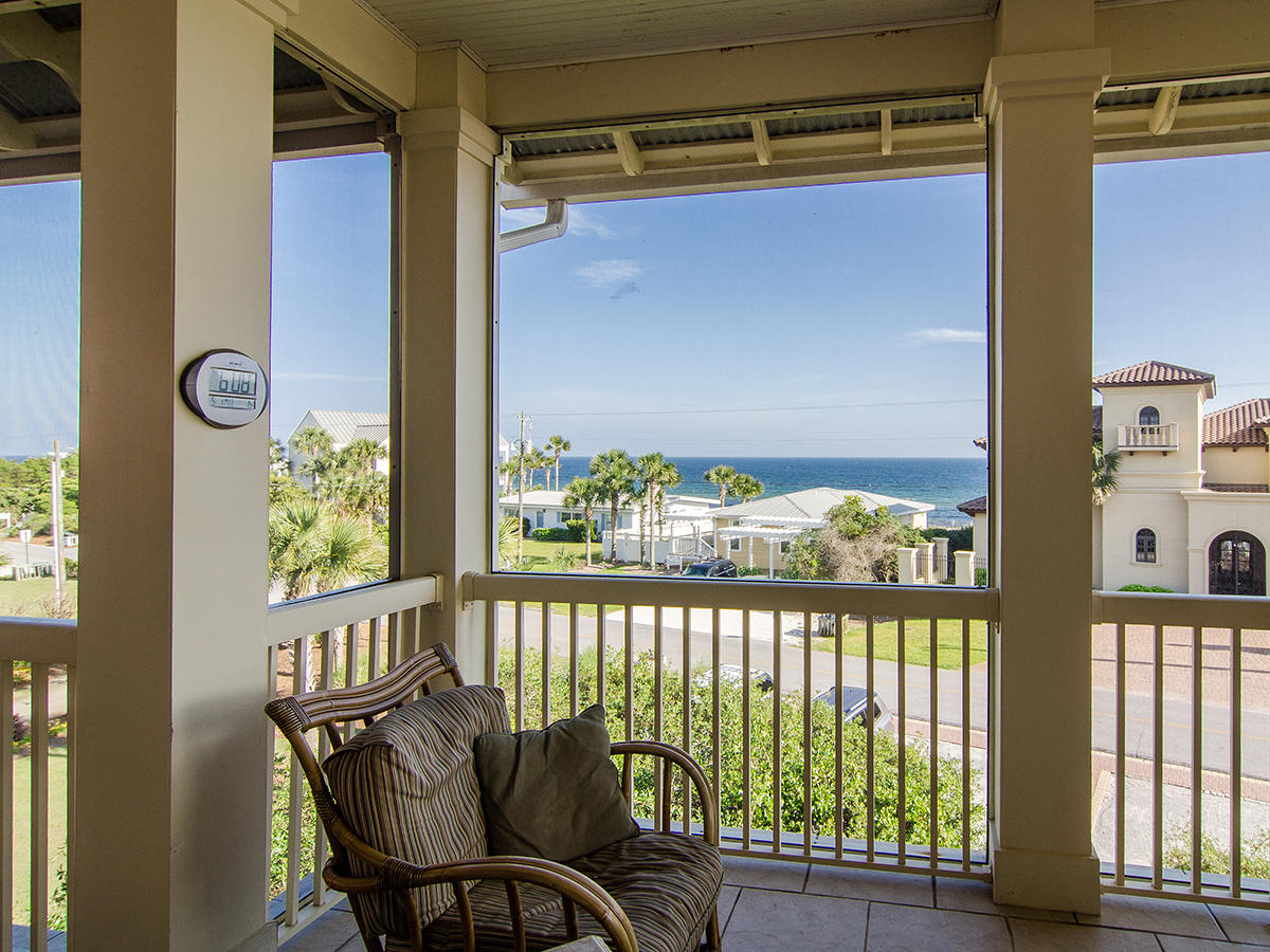 617 Blue Mountain Road Santa Rosa Beach, FL 32459 - Photo 3 of 24 a view of a balcony with furniture