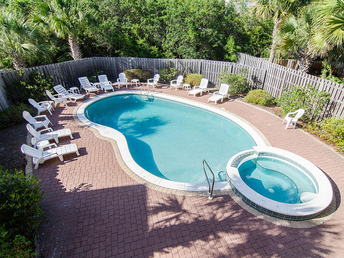 617 Blue Mountain Road Santa Rosa Beach, FL 32459 - Photo 4 of 24 a view of a swimming pool in the backyard