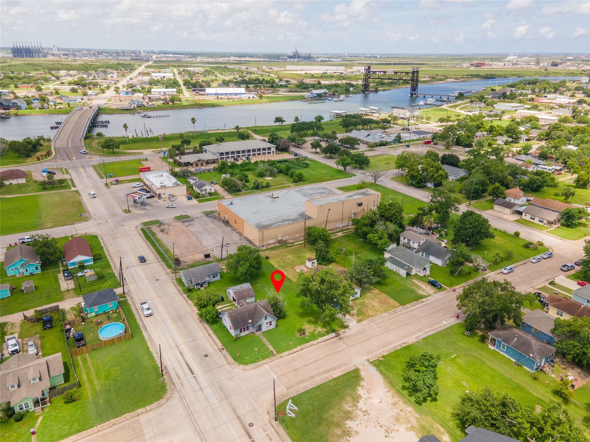 1026 West 4th Street Freeport, TX 77541 - Photo 11 of 12 an aerial view of ocean and residential houses with outdoor space