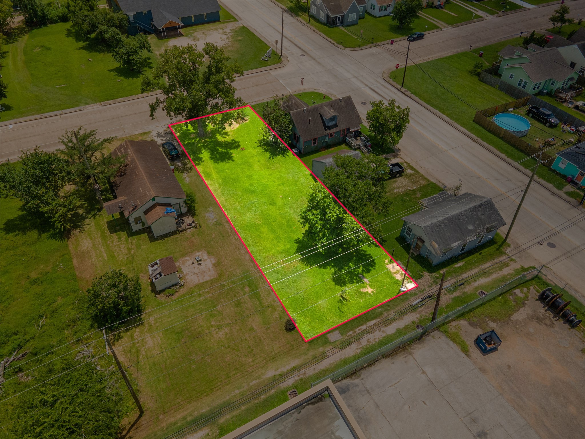 1026 West 4th Street Freeport, TX 77541 - Photo 5 of 12 an aerial view of a pool