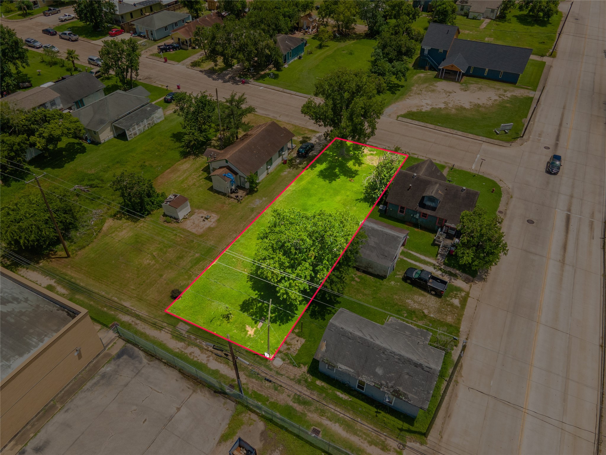 1026 West 4th Street Freeport, TX 77541 - Photo 7 of 12 an aerial view of a pool