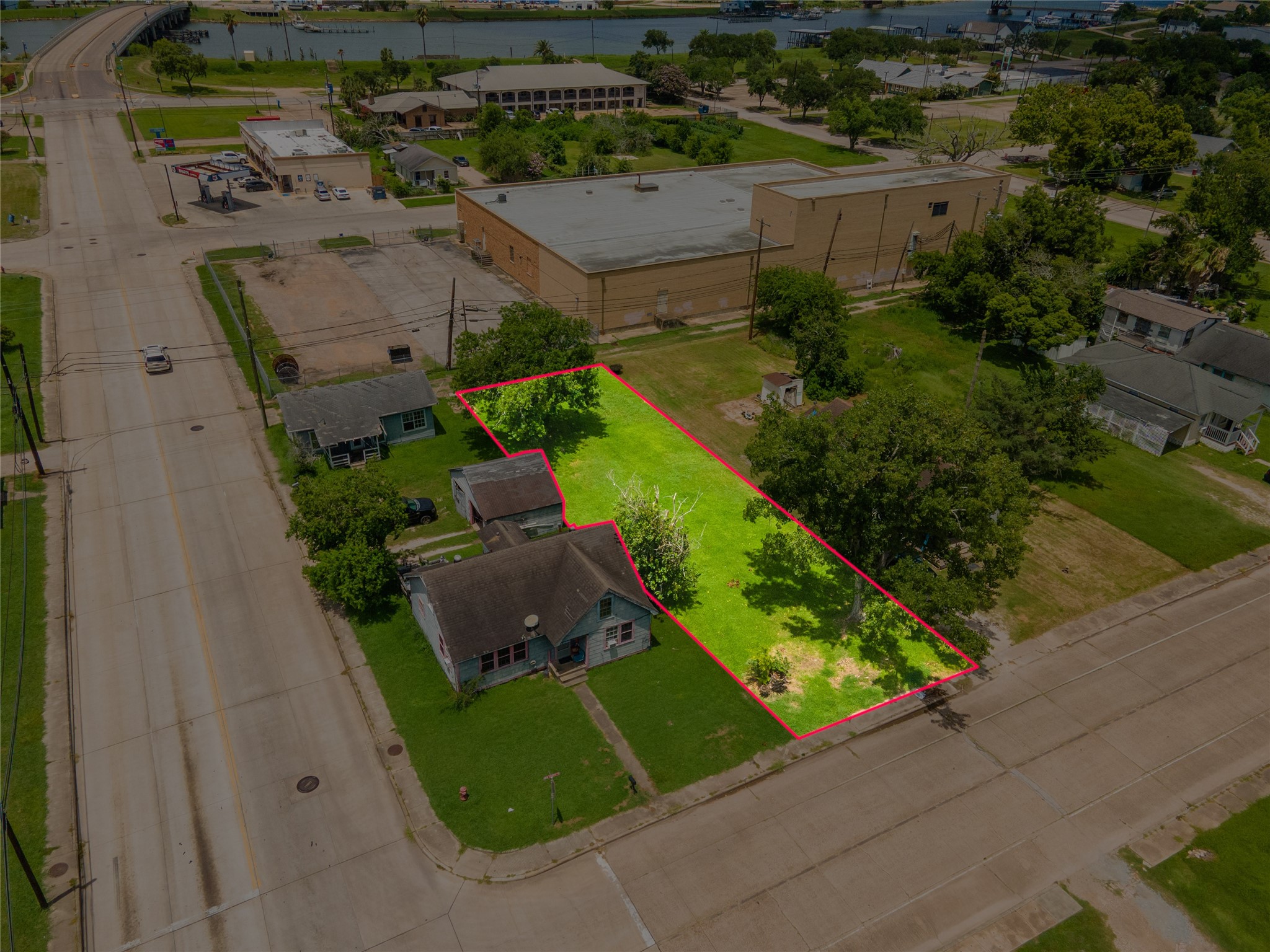 1026 West 4th Street Freeport, TX 77541 - Photo 9 of 12 an aerial view of a house with a garden