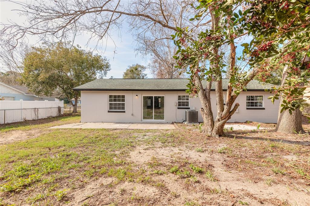 1605 Bradford Road Edgewater, FL 32132 - Photo 28 of 30 a view of a house with a yard covered with snow