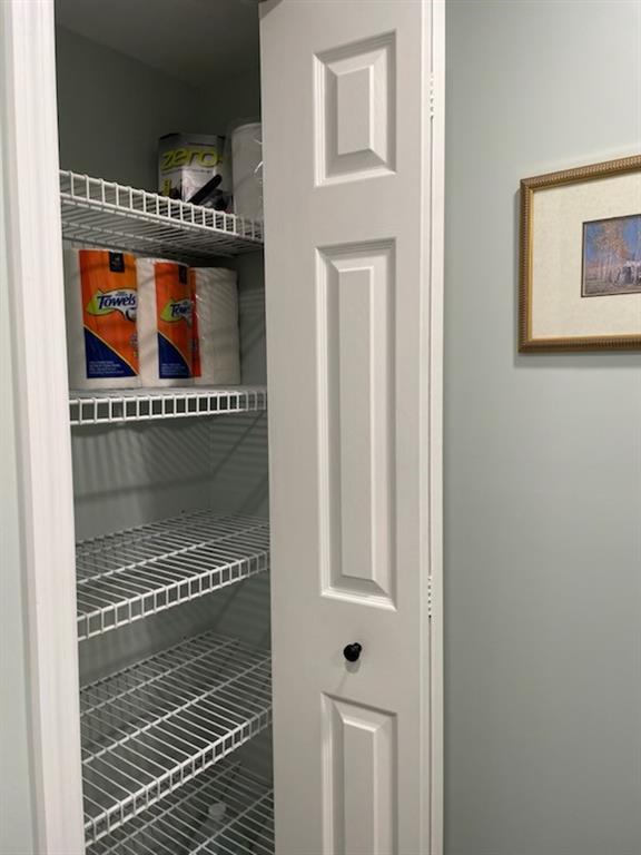 16100 Golf Club Road, Unit 301 Weston, FL 33326 - Photo 18 of 22 Closet in powder room