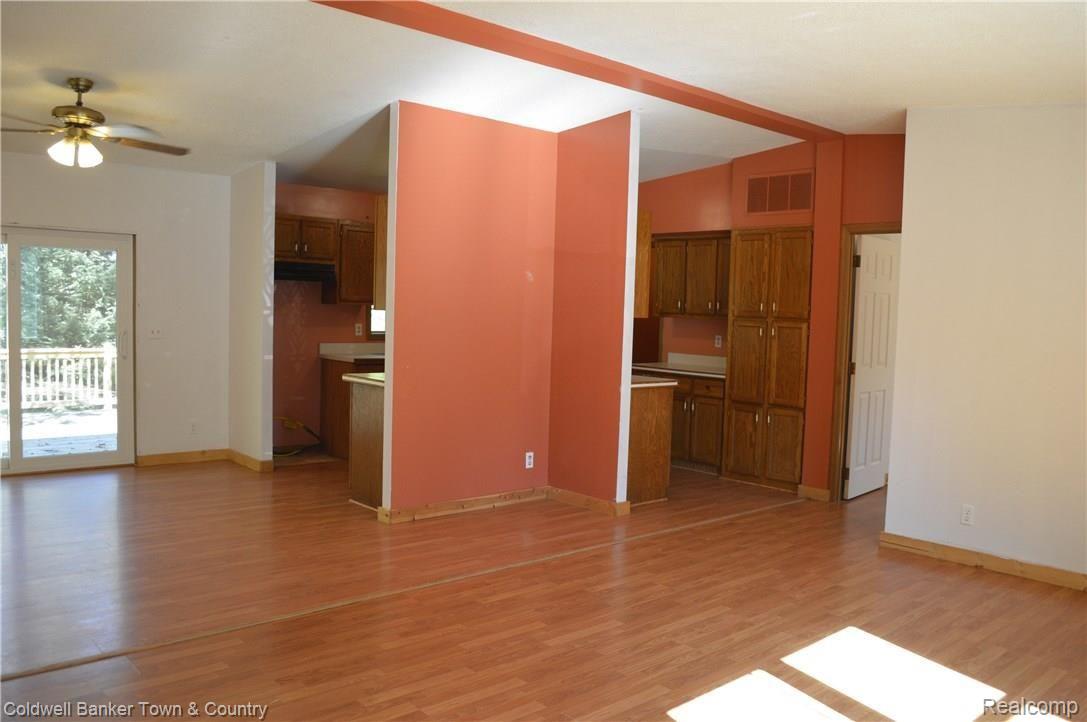 7083 Brophy Road Howell, MI 48855 - Photo 8 of 29 LIVING ROOM/DINING ROOM/KITCHEN
