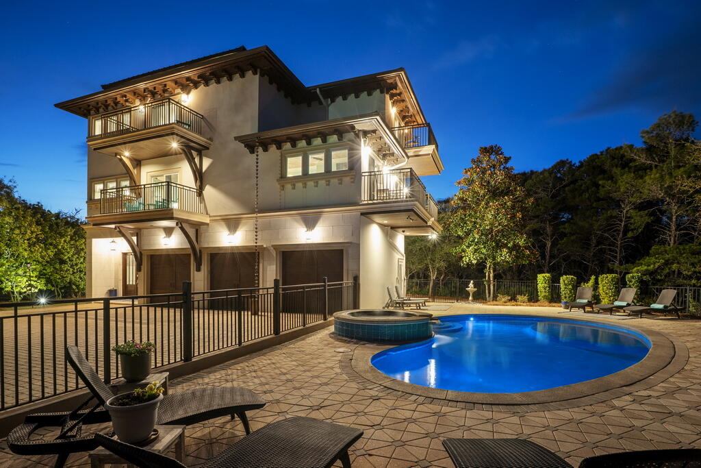 278 Savelle Drive Santa Rosa Beach, FL 32459 - Photo 1 of 157 a view of a house with swimming pool and sitting area