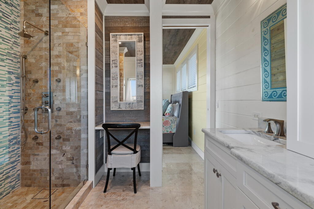 278 Savelle Drive Santa Rosa Beach, FL 32459 - Photo 102 of 157 a bathroom with a granite countertop sink a mirror and a shower