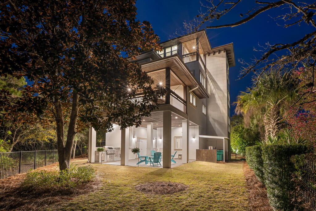 278 Savelle Drive Santa Rosa Beach, FL 32459 - Photo 155 of 157 a front view of a building with a yard