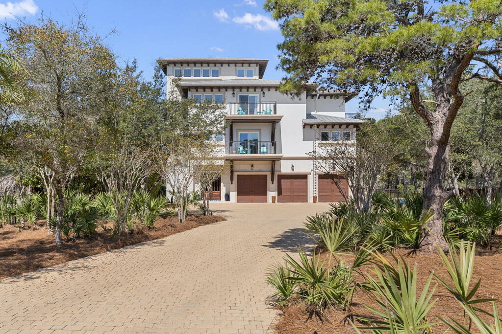 278 Savelle Drive Santa Rosa Beach, FL 32459 - Photo 36 of 157 front view of a house with a yard