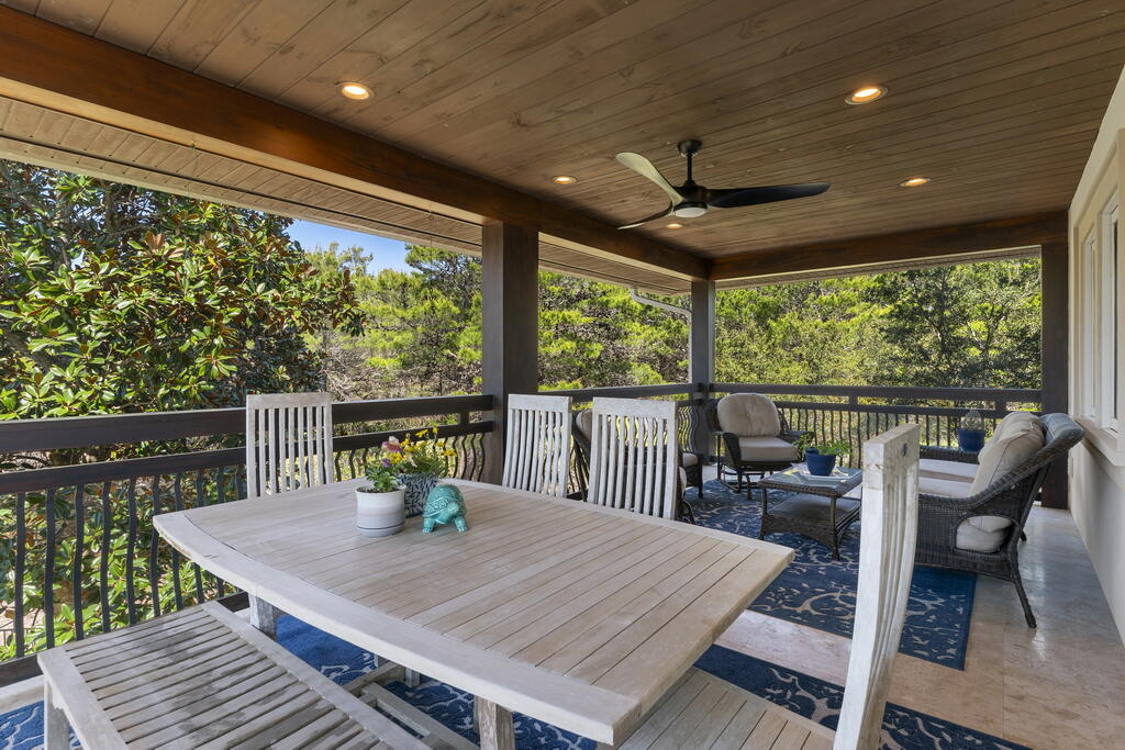 278 Savelle Drive Santa Rosa Beach, FL 32459 - Photo 49 of 157 a view of a patio with a table chairs and a patio