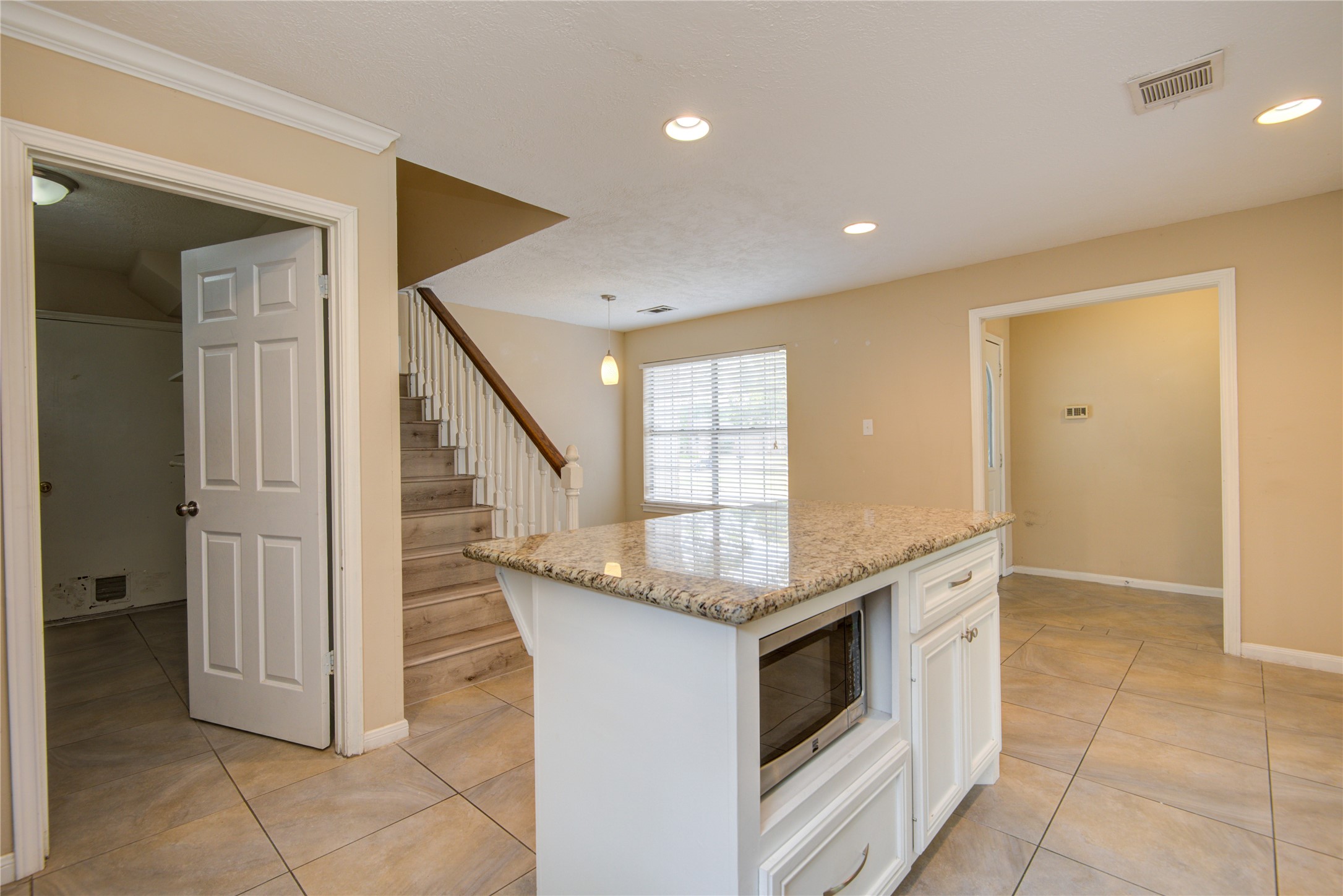14211 Ella Lee Lane Houston, TX 77077 - Photo 12 of 42 a kitchen with a sink and cabinets