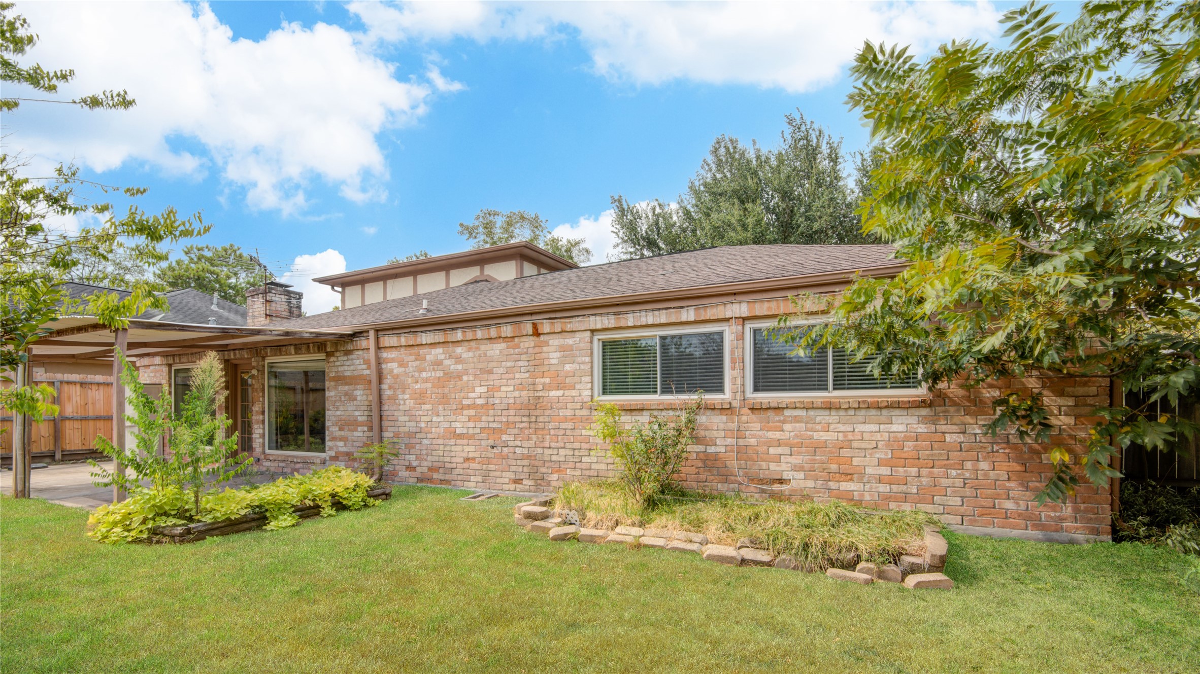 14211 Ella Lee Lane Houston, TX 77077 - Photo 40 of 42 front view of a house with a yard