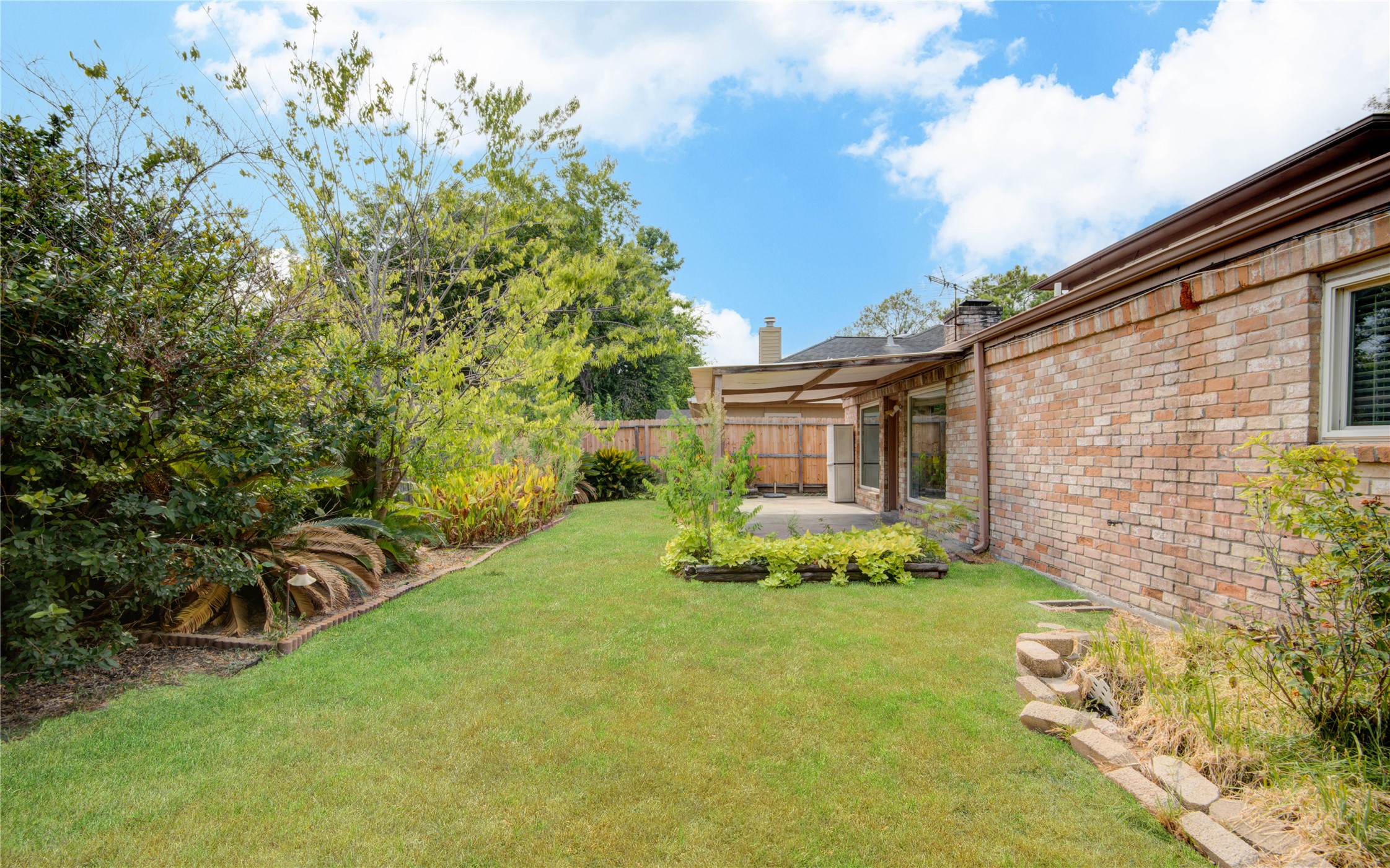 14211 Ella Lee Lane Houston, TX 77077 - Photo 41 of 42 a view of a house with backyard