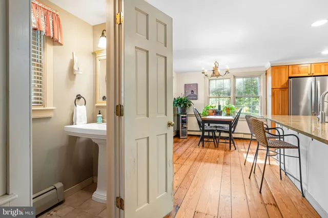 a view of a livingroom with furniture and wooden floor