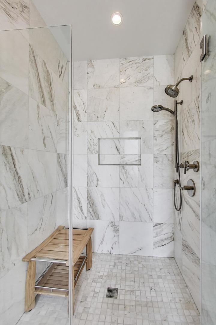 360 West Erie Street, Unit 7D Chicago, IL 60654 - Photo 20 of 39 a bathroom with a shower