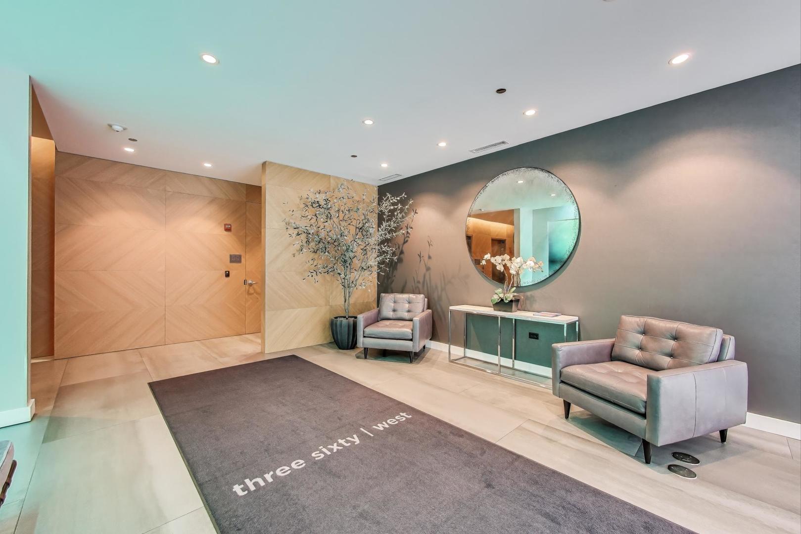 360 West Erie Street, Unit 7D Chicago, IL 60654 - Photo 38 of 39 a living room with furniture