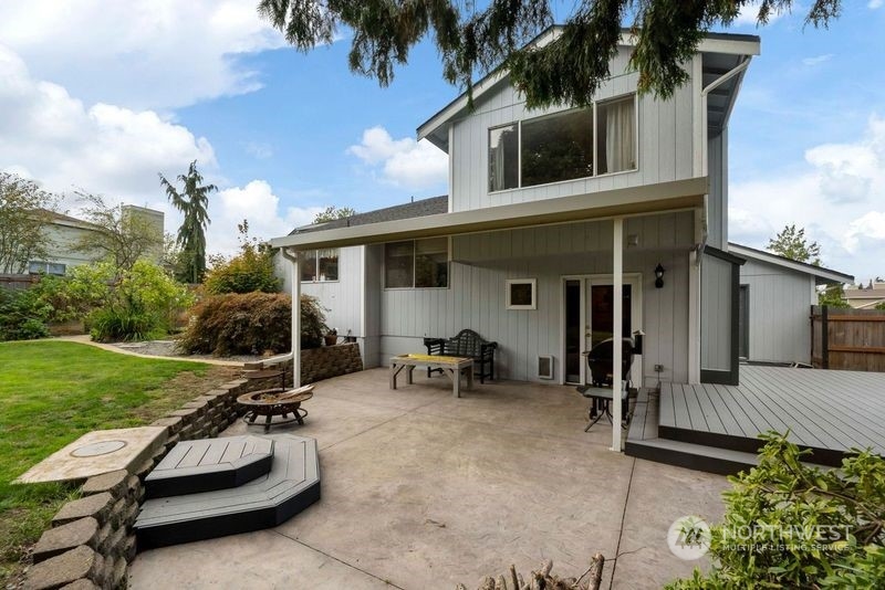 3534 Crystal Ridge Drive Southeast Puyallup, WA 98372 - Photo 12 of 39 a view of a house with yard and sitting area