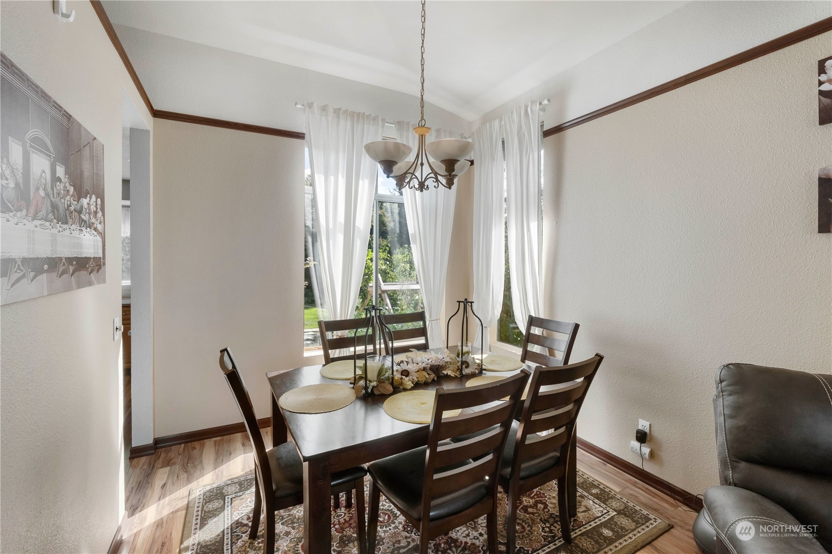3534 Crystal Ridge Drive Southeast Puyallup, WA 98372 - Photo 16 of 39 a view of a dining room with furniture window and outside view