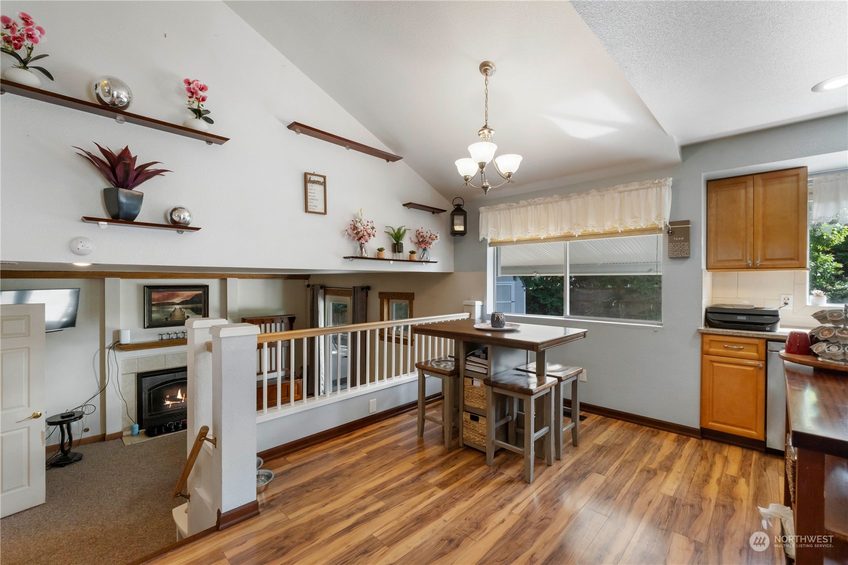 3534 Crystal Ridge Drive Southeast Puyallup, WA 98372 - Photo 19 of 39 a view of a kitchen and dining room