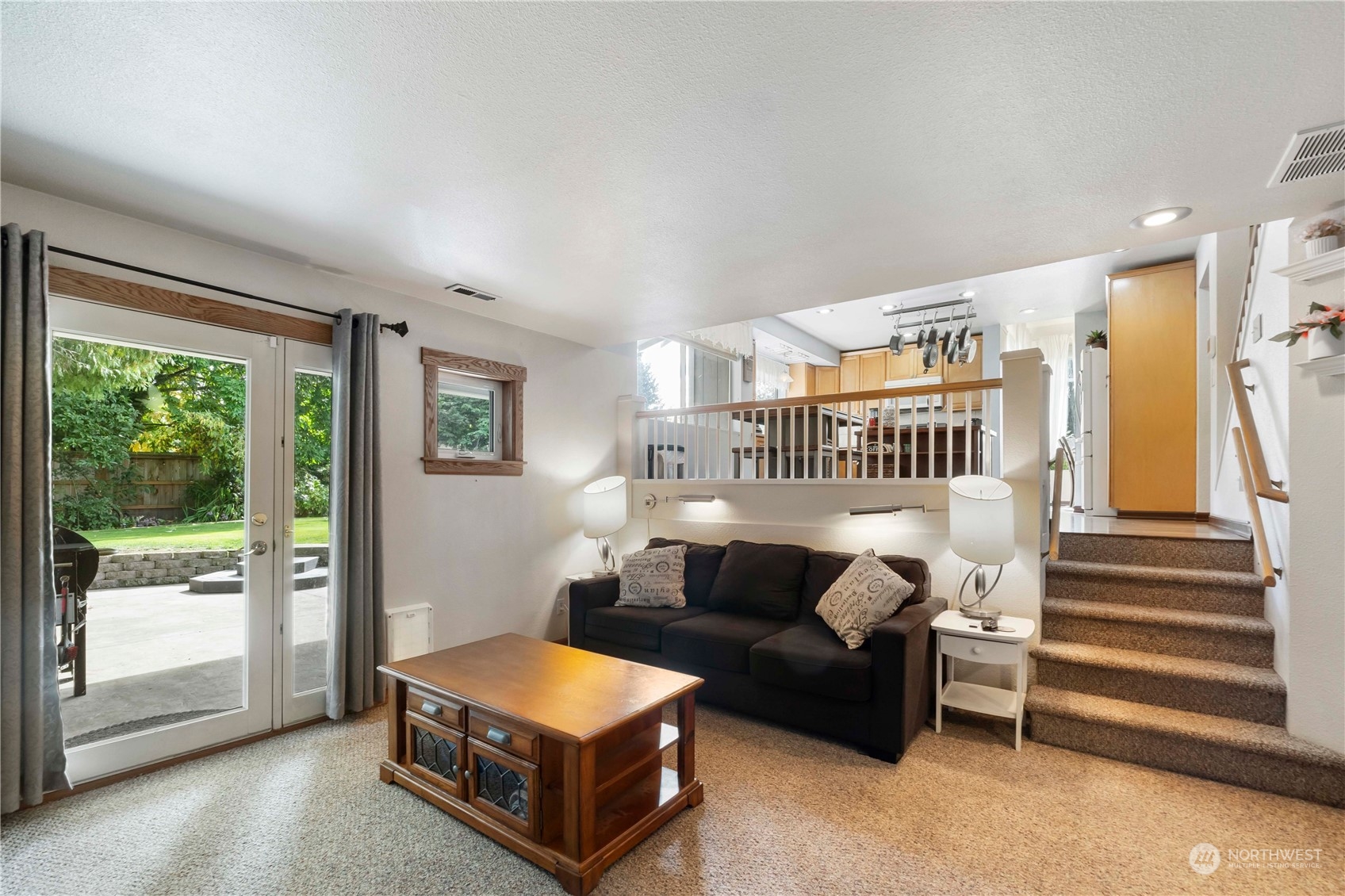 3534 Crystal Ridge Drive Southeast Puyallup, WA 98372 - Photo 26 of 39 a living room with furniture and a large window