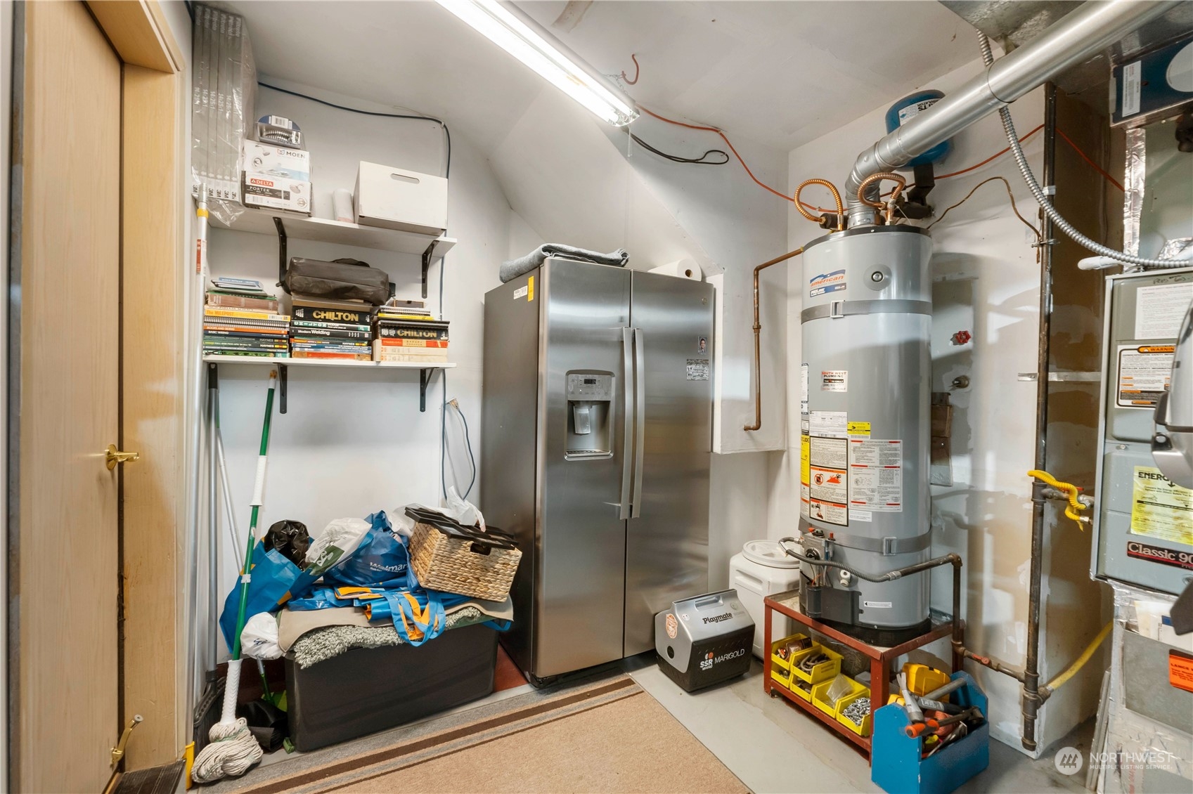 3534 Crystal Ridge Drive Southeast Puyallup, WA 98372 - Photo 29 of 39 a room with storage and utility