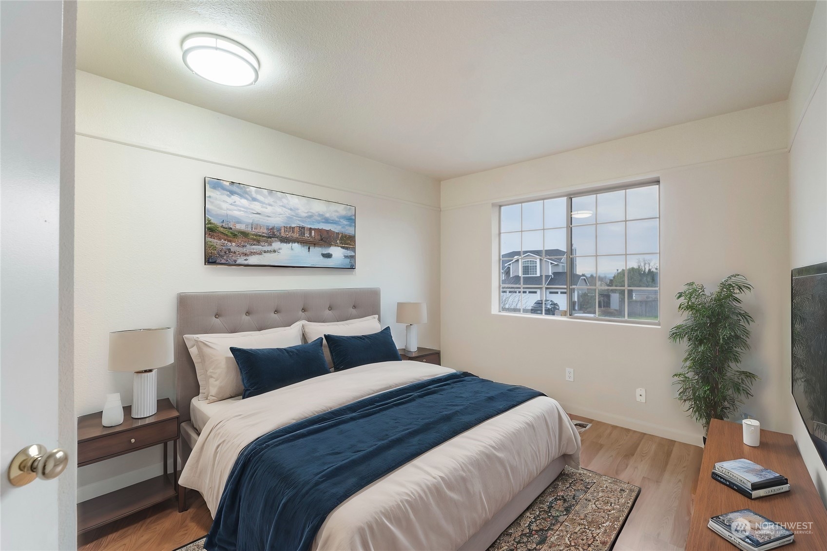 3534 Crystal Ridge Drive Southeast Puyallup, WA 98372 - Photo 4 of 39 a bedroom with bed and window