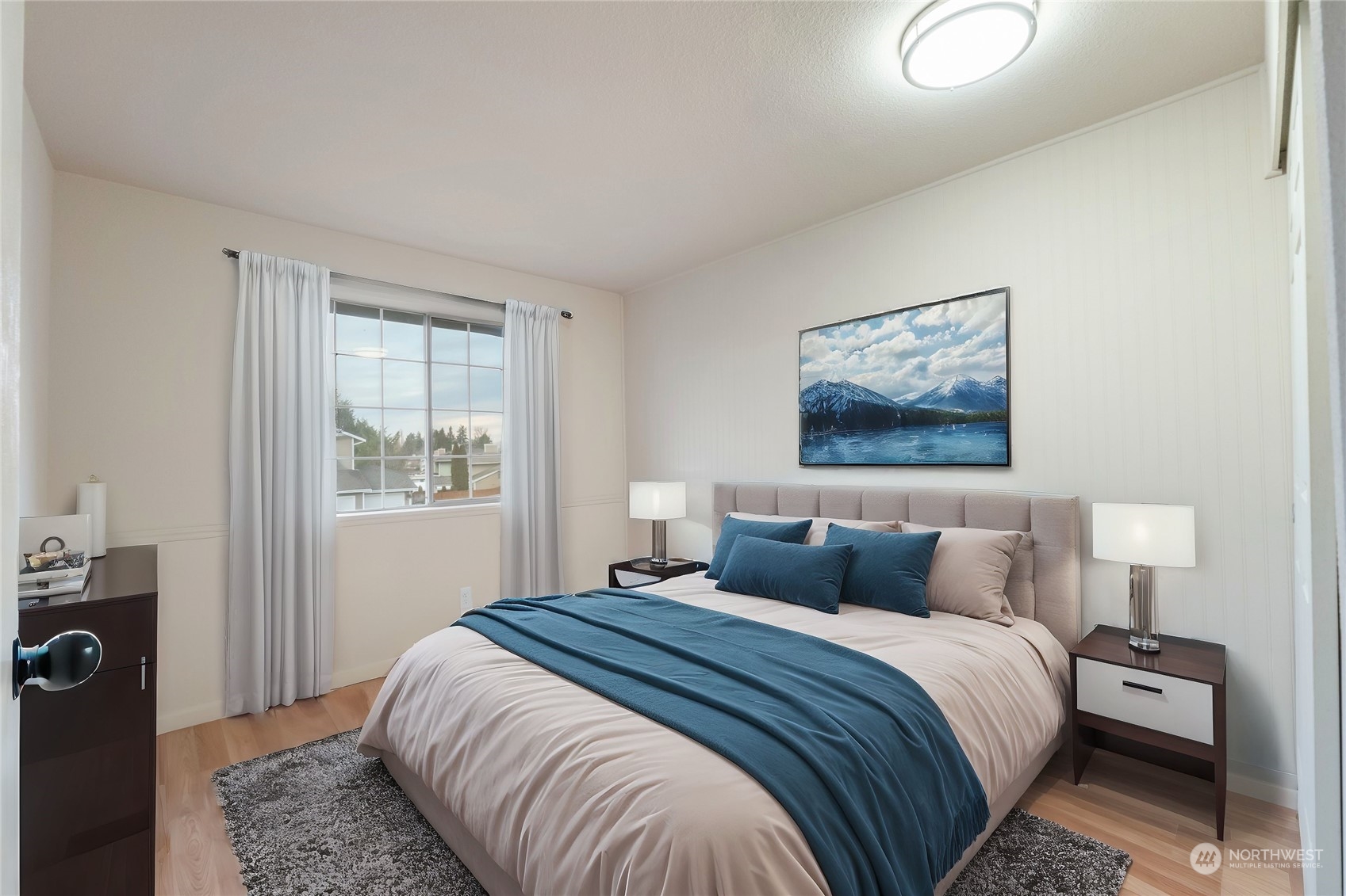 3534 Crystal Ridge Drive Southeast Puyallup, WA 98372 - Photo 6 of 39 a bedroom with a bed and a window