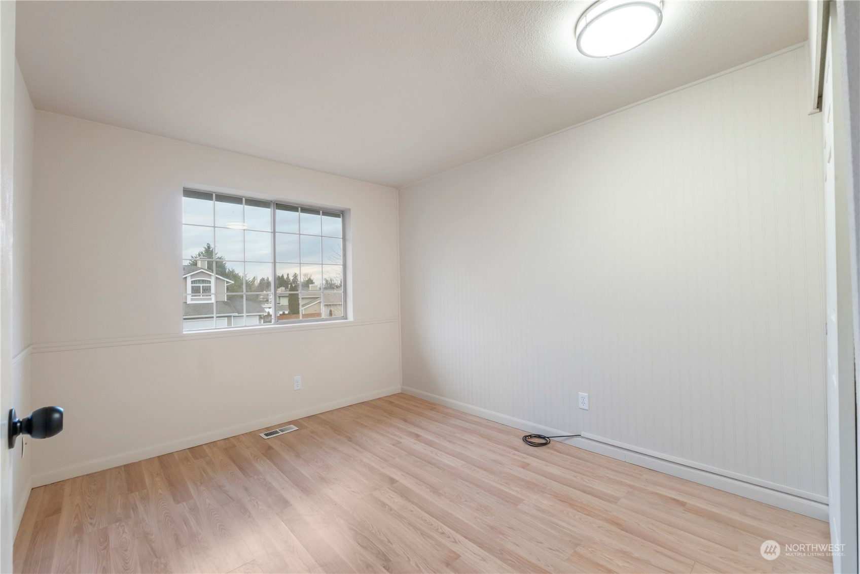 3534 Crystal Ridge Drive Southeast Puyallup, WA 98372 - Photo 7 of 39 an empty room with a window