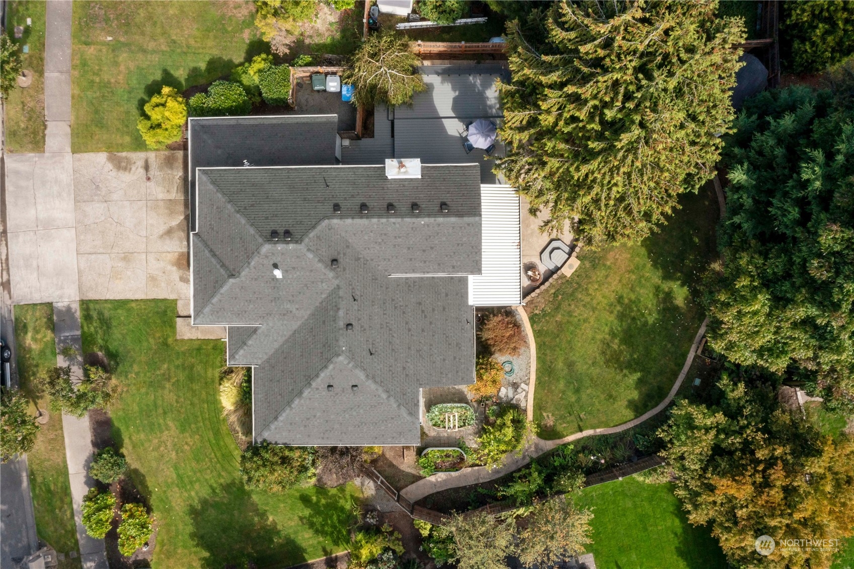 3534 Crystal Ridge Drive Southeast Puyallup, WA 98372 - Photo 10 of 39 an aerial view of a house with a yard and garden