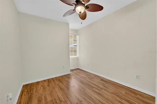 an entryway of a house with wooden floor