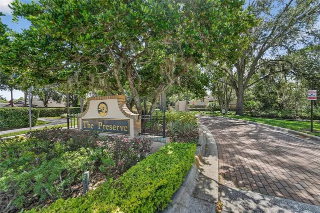 a view of a swimming pool with a lounge chair