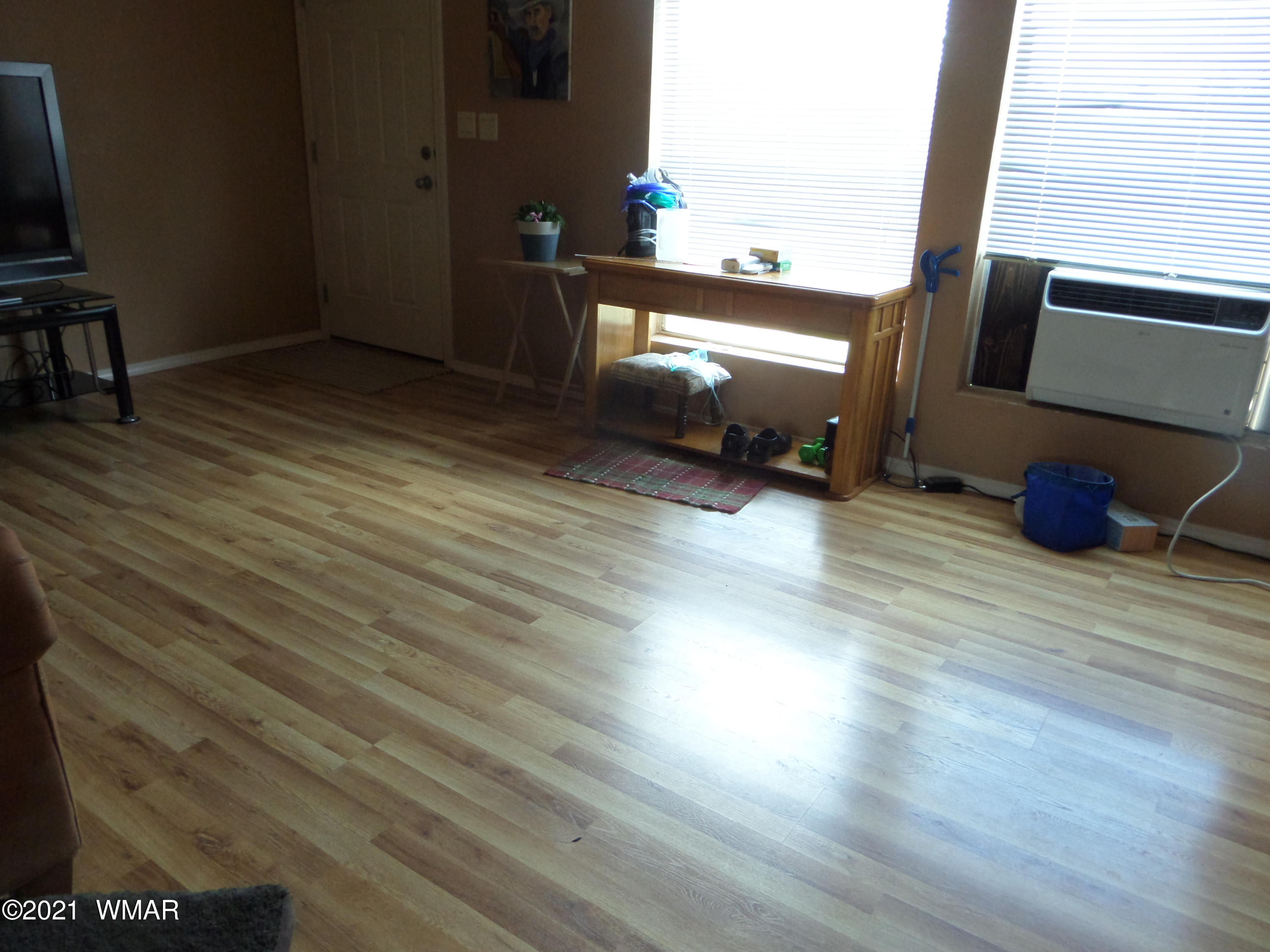 5 County Road Show Low, AZ 85901 - Photo 21 of 23 an empty room with wooden floor and windows