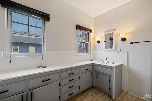 a bathroom with a toilet and a bath tub
