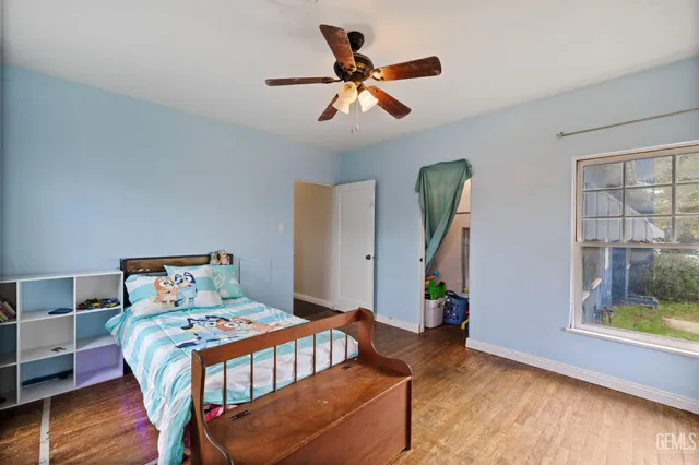 a view of house with outdoor space and trees