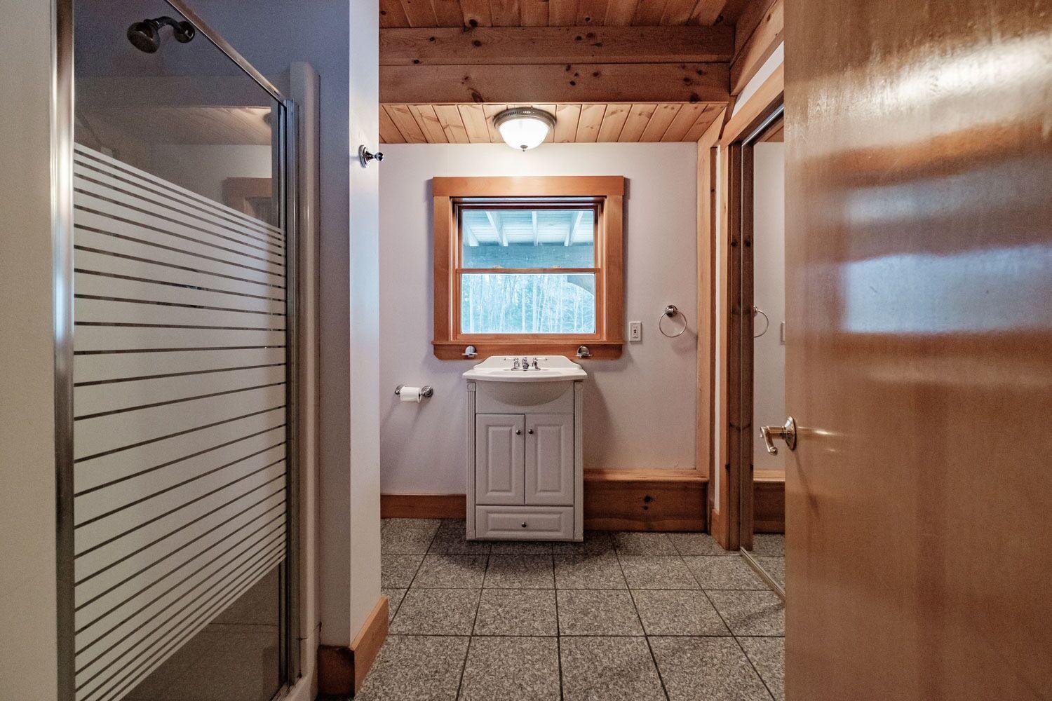 374 Songo School Road Naples, ME 04055 - Photo 8 of 25 Bathroom with shower/laundry room
