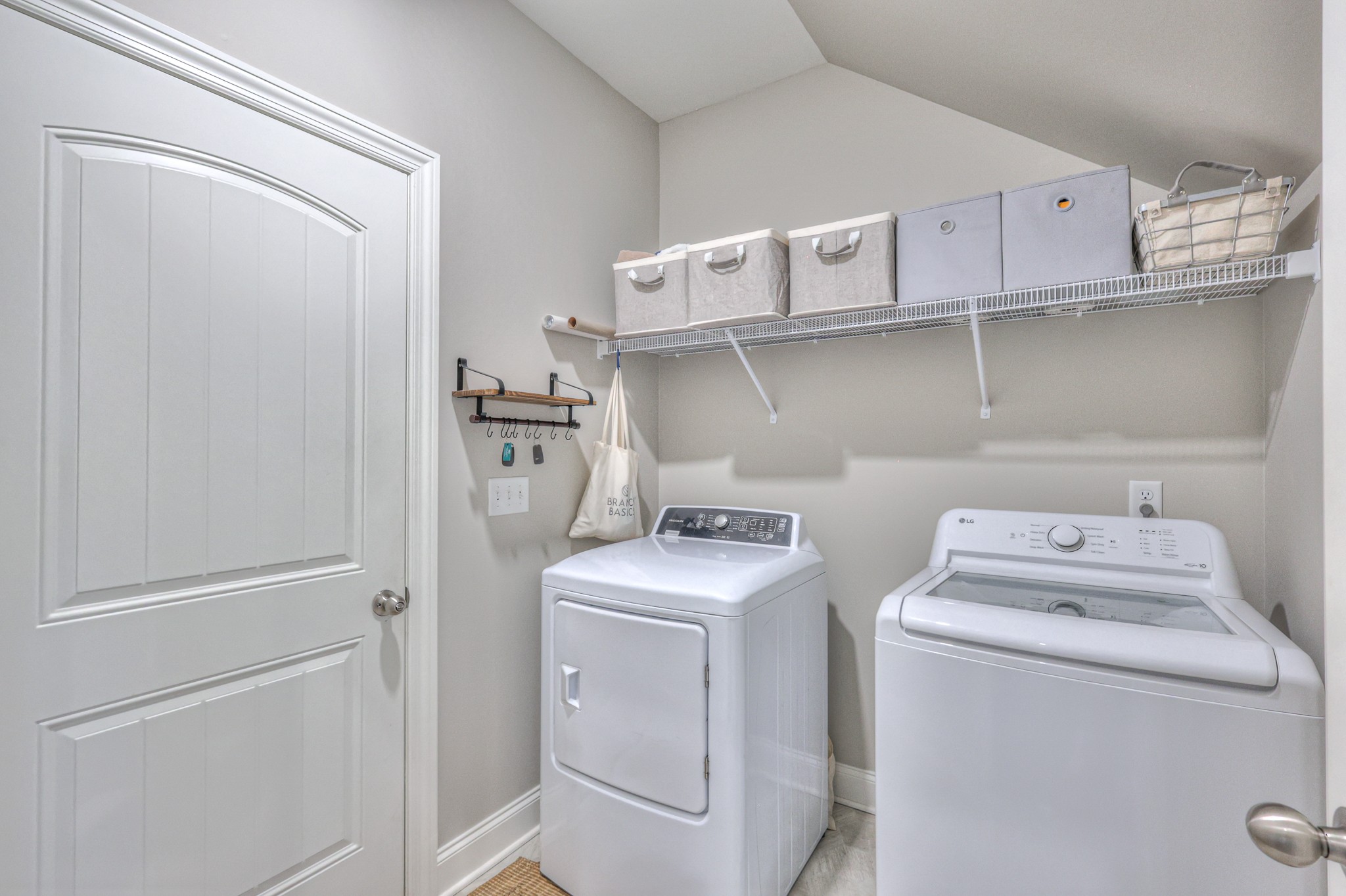 1011 Licinius Lane Murfreesboro, TN 37128 - Photo 15 of 31 a utility room with cabinets washer and dryer