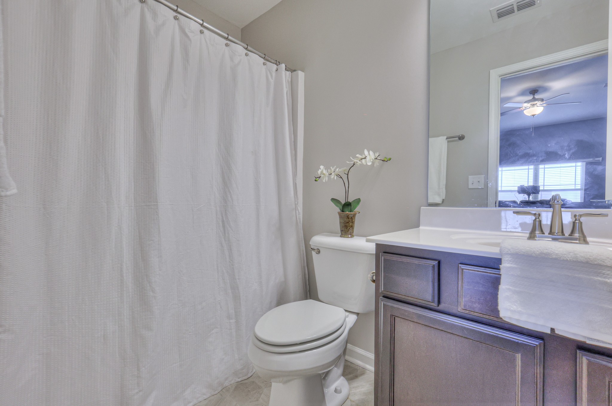 1011 Licinius Lane Murfreesboro, TN 37128 - Photo 22 of 31 a bathroom with a toilet a sink and tub