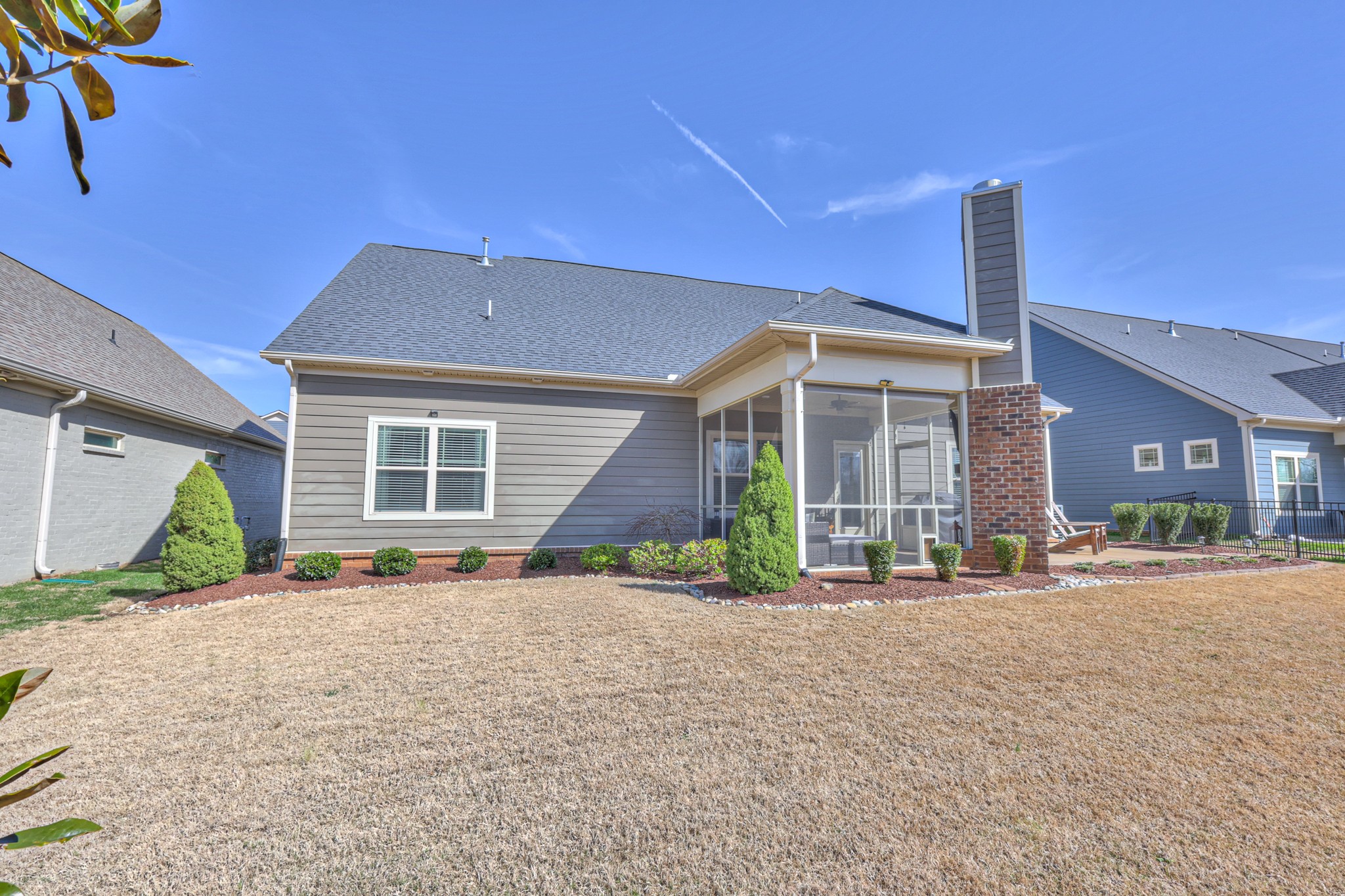 1011 Licinius Lane Murfreesboro, TN 37128 - Photo 27 of 31 a front view of a house with a yard and potted plants